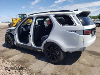 2023 Land Rover Discovery HSE R-Dynamic with VIN SALRM4EU1P2483388, listed as a Copart auction lot 57518074 with 18,063 mi miles and Salvage Title. Bid and sale history available at carsss.com. Image 2.