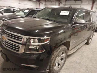 2017 Chevrolet Suburban Premier with VIN 1GNSKJKC0HR250854, listed as a IAAI auction lot 41541476 with 128,231 mi miles. Bid and sale history available at carsss.com. Image 2.