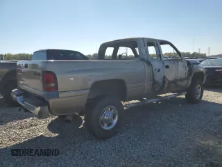 2002 Dodge 2500 z VIN 3B7KF23602M286323, wystawiony jako Copart lot #74644773 z przebiegiem Nie podano mil oraz Szkoda całkowita • Salvage title. Historia ofert i sprzedaży dostępna na DreamBid. Obrazek 3.