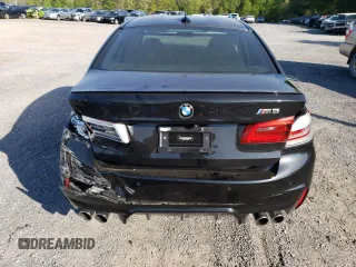 2018 BMW M5 z VIN WBSJF0C5XJB282107, wystawiony jako Copart lot #49979943 z przebiegiem 55 243 mil mil oraz . Historia ofert i sprzedaży dostępna na DreamBid. Obrazek 6.