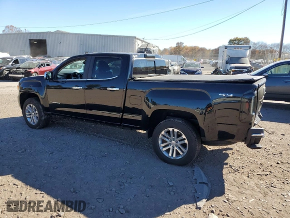 2016 GMC Canyon 4WD SLT with VIN 1GTP6DE11G1357147, listed as a Copart auction lot 77835344 with 106,890 mi miles and Salvage Title. Bid and sale history available at carsss.com. Image 2.