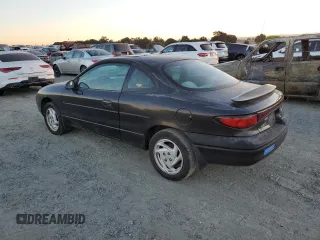 1998 Ford Escort z VIN 3FALP1131WR101490, wystawiony jako Copart lot #74065584 z przebiegiem 144 659 mil mil oraz Szkoda całkowita • Salvage title. Historia ofert i sprzedaży dostępna na DreamBid. Obrazek 2.