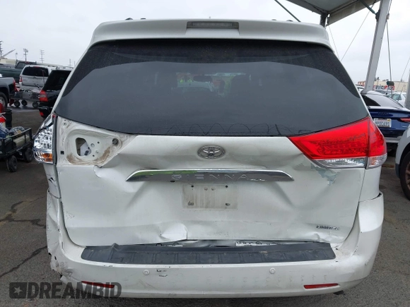 2011 Toyota Sienna XLE AAS with VIN 5TDYK3DC8BS148948, listed as a IAAI auction lot 41806293 with 144,645 mi miles and . Bid and sale history available at DreamBid. Image 17.