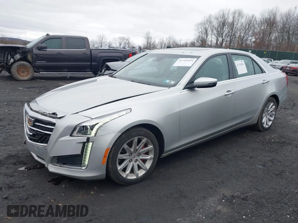 2014 Cadillac CTS Luxury AWD z VIN 1G6AX5SX3E0194895, wystawiony jako IAAI lot #41741824 z przebiegiem 197 042 mil mil oraz . Historia ofert i sprzedaży dostępna na DreamBid. Obrazek 2.