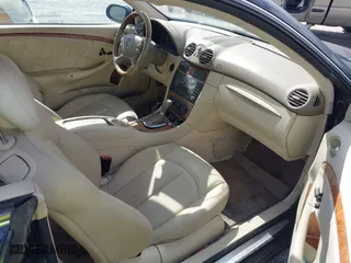 2006 Mercedes-Benz CLK-Class 3.5L with VIN WDBTJ56J56F199770, listed as a IAAI auction lot 42009746 with 110,410 mi miles. Bid and sale history available at carsss.com. Image 5.