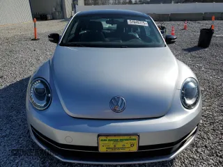 2012 Volkswagen Beetle 2.0T Turbo w/Sun/Snd/Nav PZEV with VIN 3VWVA7AT6CM662796, listed as a Copart auction lot 51649775 with 61,785 mi miles and Clean Title. Bid and sale history available at carsss.com. Image 5.