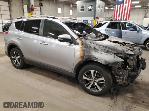 2018 Toyota RAV4 XLE with VIN JTMRFREV2JD234942, listed as a Copart auction lot 54136645 with Not Provided miles and Salvage Title. Bid and sale history available at DreamBid. Image 4.