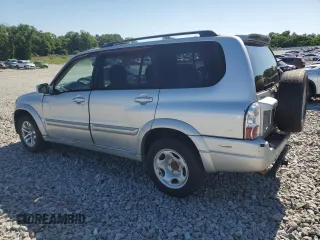 2004 Suzuki XL7 LX z VIN JS3TY92V144105911, wystawiony jako Copart lot #56744425 z przebiegiem 253 975 mil mil oraz Szkoda całkowita • Salvage title. Historia ofert i sprzedaży dostępna na DreamBid. Obrazek 2.