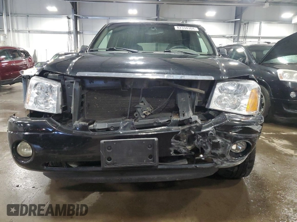 2004 GMC Envoy SLT with VIN 1GKDT13S642191868, listed as a Copart auction lot 82334304 with 150,810 mi miles and Salvage Title. Bid and sale history available at carsss.com. Image 5.