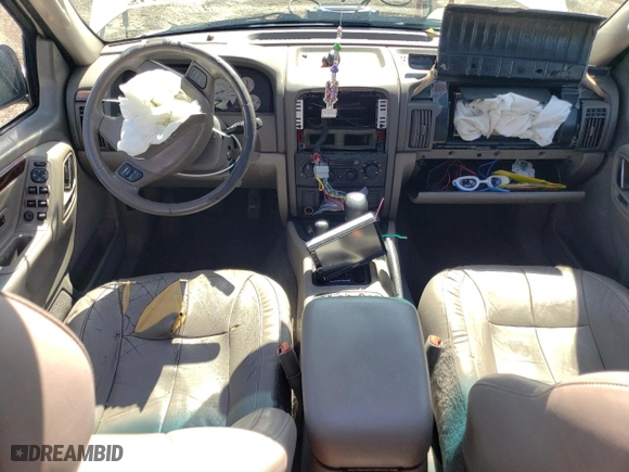 2003 Jeep Grand Cherokee Limited with VIN 1J4GW58N83C511981, listed as a Copart auction lot 61734014 with 174,775 mi miles and Salvage Title. Bid and sale history available at carsss.com. Image 8.