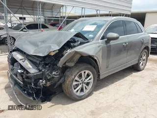 2021 Audi Q3 S line Premium z VIN WA1DECF33M1040282, wystawiony jako IAAI lot #42162587 z przebiegiem 90 509 mil mil oraz . Historia ofert i sprzedaży dostępna na DreamBid. Obrazek 2.