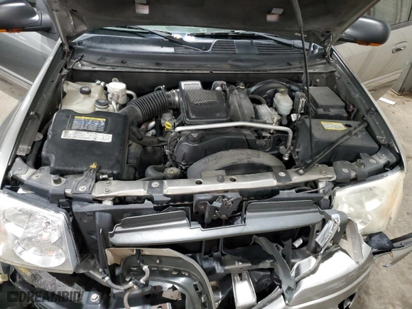 2005 GMC Envoy SLE with VIN 1GKDS13S252229262, listed as a Copart auction lot 51214685 with 117,256 mi miles and Salvage Title. Bid and sale history available at carsss.com. Image 12.