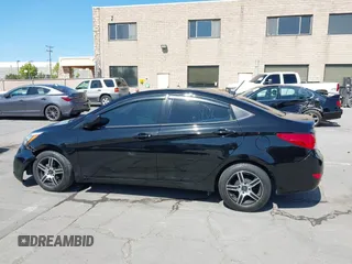 2015 Hyundai Accent GLS with VIN KMHCT4AE8FU936127, listed as a IAAI auction lot 42182291 with 161,828 mi miles and . Bid and sale history available at DreamBid. Image 14.