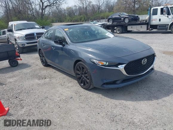 2024 Mazda 3 S Carbon Edition with VIN 3MZBPBCM3RM416565, listed as a IAAI auction lot 42047841 with 11,074 mi miles and . Bid and sale history available at DreamBid. Image 1.