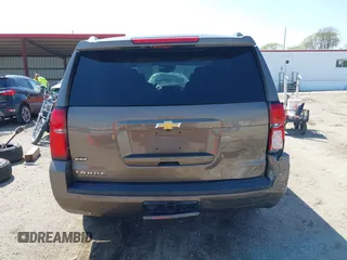 2016 Chevrolet Tahoe LT with VIN 1GNSKBKC9GR434579, listed as a IAAI auction lot 42080094 with 137,910 mi miles and . Bid and sale history available at DreamBid. Image 17.