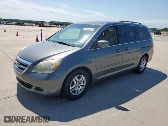 2007 Honda Odyssey EX with VIN 5FNRL38437B068697, listed as a Copart auction lot 60875505 with 211,688 mi miles and Salvage title. Bid and sale history available at DreamBid. Image 1.