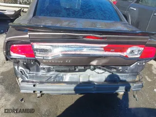 2013 Dodge Charger SE with VIN 2C3CDXBG2DH609438, listed as a IAAI auction lot 41649615 with 236,024 mi miles. Bid and sale history available at carsss.com. Image 6.