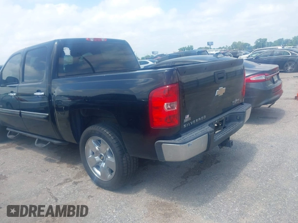 2011 Chevrolet Silverado 1500 LT with VIN 3GCPCSE06BG391860, listed as a IAAI auction lot 42077801 with 214,709 mi miles and . Bid and sale history available at DreamBid. Image 3.