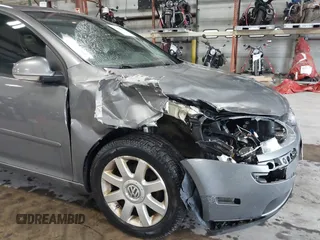 2009 Volkswagen Rabbit S with VIN WVWDB71K39W142437, listed as a IAAI auction lot 42426555 with 154,571 mi miles and . Bid and sale history available at DreamBid. Image 6.