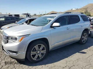 2017 GMC Acadia Denali with VIN 1GKKNPLS3HZ140300, listed as a Copart auction lot 56922725 with 137,626 mi miles and Salvage title. Bid and sale history available at DreamBid. Image 1.
