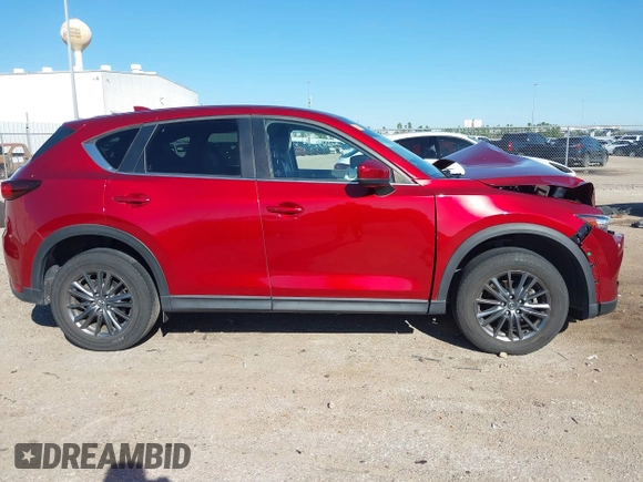 2020 Mazda CX-5 Touring with VIN JM3KFACM1L0756864, listed as a IAAI auction lot 41761131 with 16,646 mi miles and . Bid and sale history available at carsss.com. Image 13.