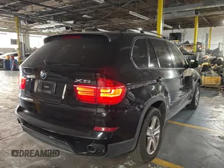2011 BMW X5 35d with VIN 5UXZW0C55BL661651, listed as a Copart auction lot 61866905 with 162,927 mi miles and Clean title. Bid and sale history available at DreamBid. Image 4.