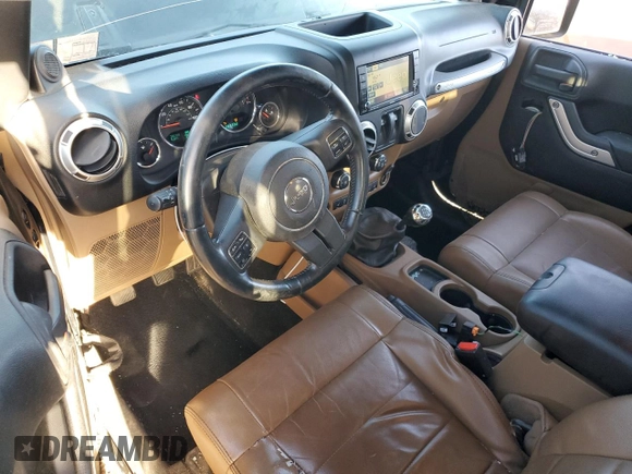 2011 Jeep Wrangler Sahara with VIN 1J4GA5D16BL567739, listed as a Copart auction lot 73542244 with 282,392 mi miles and Non Repairable. Bid and sale history available at DreamBid. Image 8.