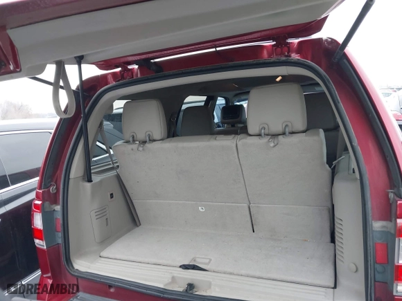2015 Lincoln Navigator with VIN 5LMJJ2JT5FEJ11296, listed as a IAAI auction lot 41233028 with 189,509 mi miles. Bid and sale history available at carsss.com. Image 12.