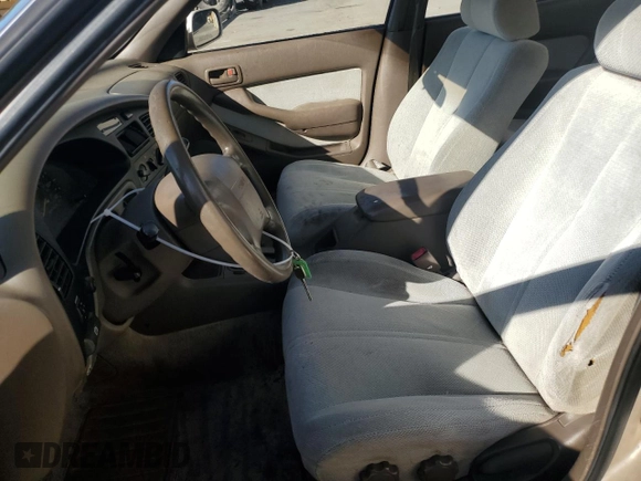 1994 Toyota Camry LE z VIN JT2GK12EXR0070117, wystawiony jako Copart lot #75997244 z przebiegiem 185 759 mil mil oraz Czysty tytuł • Clean title. Historia ofert i sprzedaży dostępna na DreamBid. Obrazek 7.