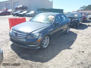 2013 Mercedes-Benz C-Class C 300 Sport with VIN WDDGF8AB3DG122480, listed as a IAAI auction lot 41805512 with 118,841 mi miles. Bid and sale history available at carsss.com. Image 2.