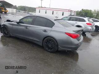 2015 Infiniti Q50 Premium with VIN JN1BV7APXFM358127, listed as a IAAI auction lot 42364173 with 97,512 mi miles and . Bid and sale history available at DreamBid. Image 3.