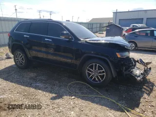 2019 Jeep Grand Cherokee Limited with VIN 1C4RJFBG5KC713902, listed as a Copart auction lot 57871925 with 119,778 mi miles and Salvage title. Bid and sale history available at DreamBid. Image 4.