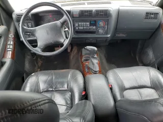 1997 Oldsmobile Bravada z VIN 1GHDT13W7V2711487, wystawiony jako Copart lot #57820455 z przebiegiem 182 784 mil mil oraz Tytuł czysty. Historia ofert i sprzedaży dostępna na DreamBid. Obrazek 8.