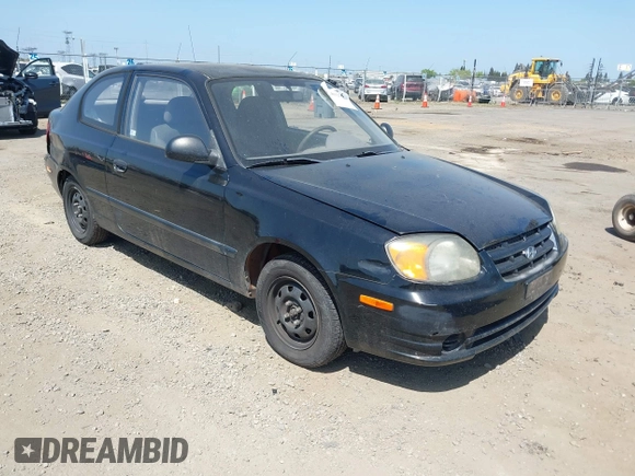 2003 Hyundai Accent with VIN KMHCF35CX3U271513, listed as a IAAI auction lot 42083235 with 166,240 mi miles. Bid and sale history available at carsss.com. Image 1.