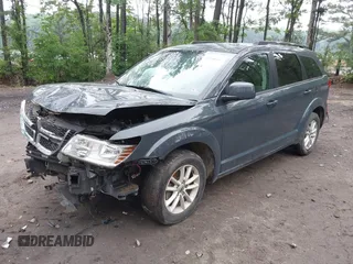 2018 Dodge Journey SXT z VIN 3C4PDCBB7JT409958, wystawiony jako IAAI lot #42200397 z przebiegiem 146 306 mil mil oraz . Historia ofert i sprzedaży dostępna na DreamBid. Obrazek 18.