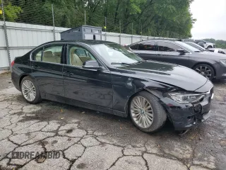 2014 BMW 3 Series 328i with VIN WBA3C1C5XEK105543, listed as a Copart auction lot 58548015 with 156,721 mi miles and Salvage title. Bid and sale history available at DreamBid. Image 4.