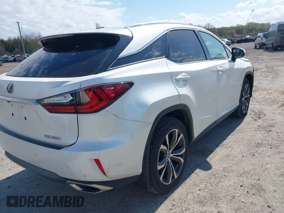 2018 Lexus RX 350 with VIN 2T2BZMCA2JC164234, listed as a IAAI auction lot 42030641 with 74,160 mi miles and . Bid and sale history available at DreamBid. Image 4.