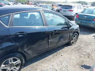 2019 Ford Fiesta SE with VIN 3FADP4EJ5KM113535, listed as a IAAI auction lot 39659709 with 100,730 mi miles. Bid and sale history available at carsss.com. Image 6.