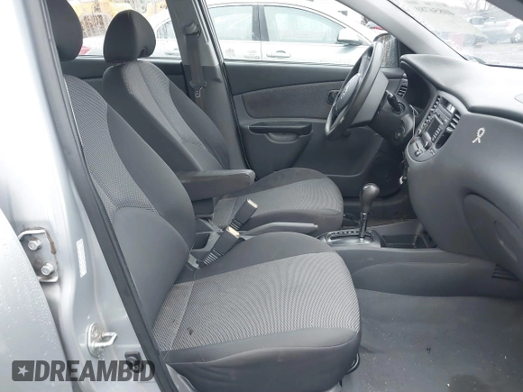 2010 Kia Rio LX with VIN KNADH4A37A6645279, listed as a IAAI auction lot 40856780 with 165,385 mi miles. Bid and sale history available at carsss.com. Image 5.