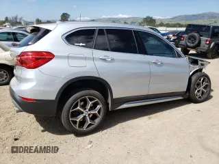 2018 BMW X1 sDrive28i with VIN WBXHU7C38J3H42948, listed as a Copart auction lot 52061793 with 26,991 mi miles. Bid and sale history available at carsss.com. Image 3.