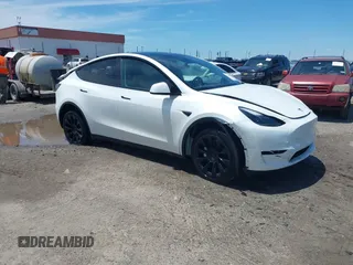 2023 Tesla Model Y Long Range with VIN 7SAYGDEE9PF753051, listed as a IAAI auction lot 39615839 with Not provided miles and . Bid and sale history available at DreamBid. Image 1.