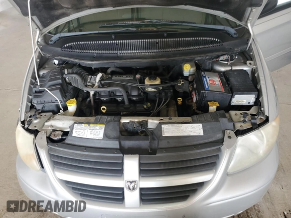 2006 Dodge Grand Caravan SXT z VIN 2D4GP44L26R816439, wystawiony jako Copart lot #52609115 z przebiegiem 127 307 mil mil oraz Szkody całkowita. Historia ofert i sprzedaży dostępna na DreamBid. Obrazek 13.