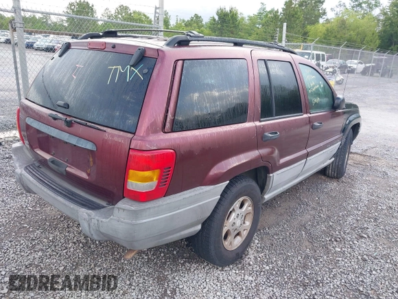 2000 Jeep Grand Cherokee Laredo with VIN 1J4G248S0YC351033, listed as a IAAI auction lot 42165830 with 145,351 mi miles and . Bid and sale history available at DreamBid. Image 4.