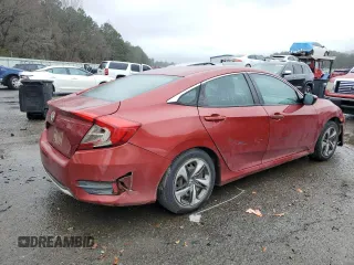 2019 Honda Civic LX with VIN 19XFC2F66KE041011, listed as a Copart auction lot 88009095 with 95,766 mi miles and Salvage Title. Bid and sale history available at DreamBid. Image 3.
