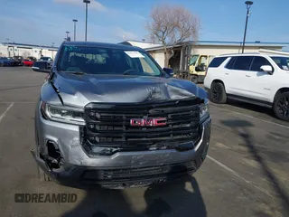 2021 GMC Acadia SLE with VIN 1GKKNKLA4MZ168921, listed as a IAAI auction lot 41562602 with 26,370 mi miles and . Bid and sale history available at DreamBid. Image 12.