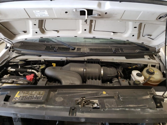 2010 Ford Econoline Wagon XL with VIN 1FBSS3BL8ADA62210, listed as a Copart auction lot 69939574 with 111,593 mi miles and Salvage Title. Bid and sale history available at carsss.com. Image 12.