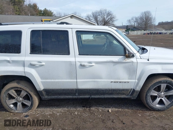 2016 Jeep Patriot Latitude with VIN 1C4NJPFA2GD562612, listed as a IAAI auction lot 41639913 with 120,823 mi miles and . Bid and sale history available at DreamBid. Image 14.