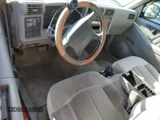 1997 GMC Sonoma SLS with VIN 1GTCS19XXVK506122, listed as a Copart auction lot 82875544 with 148,914 mi miles and Salvage Title. Bid and sale history available at carsss.com. Image 8.