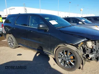 2014 Dodge Durango SXT with VIN 1C4RDHAG8EC353808, listed as a IAAI auction lot 41264850 with 196,716 mi miles and . Bid and sale history available at carsss.com. Image 14.