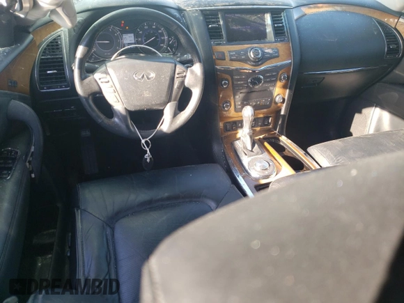 2012 Infiniti QX56 8-passenger with VIN JN8AZ2ND0C9716452, listed as a Copart auction lot 84933724 with 127,884 mi miles and Salvage Title. Bid and sale history available at carsss.com. Image 8.